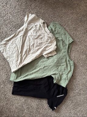 Three compression workout shirts